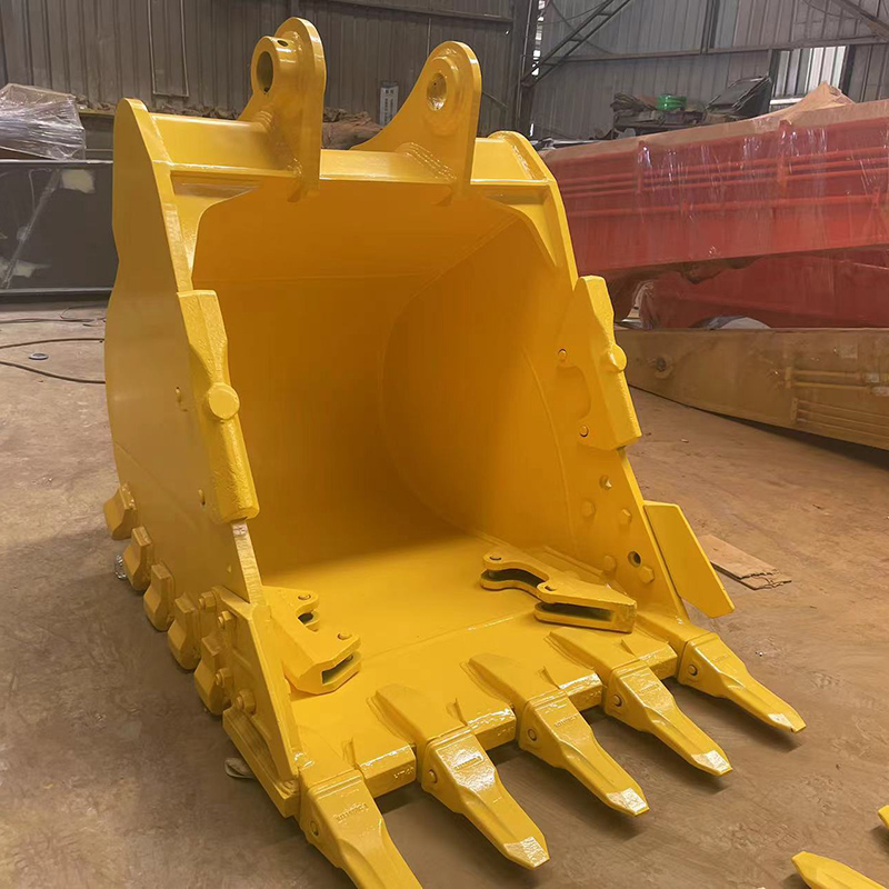 PC200 rock bucket has side cutters and guards